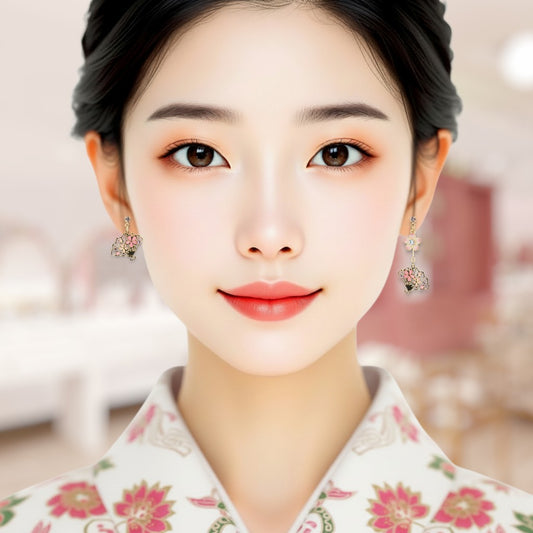 Woman wearing traditional attire with floral patterns and earrings in a blurred indoor setting