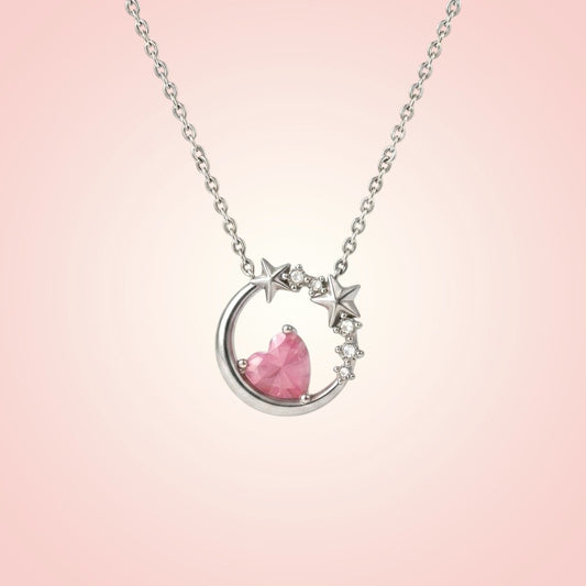 Necklace with pink heart and star pendant on a pink background