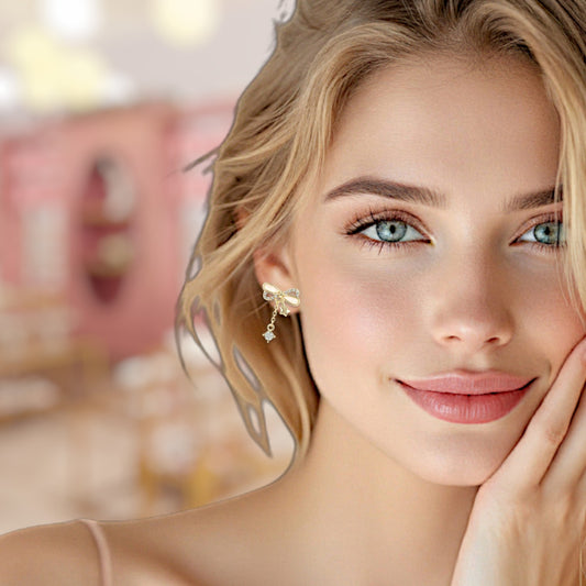Close-up of a woman wearing earrings with a blurred background