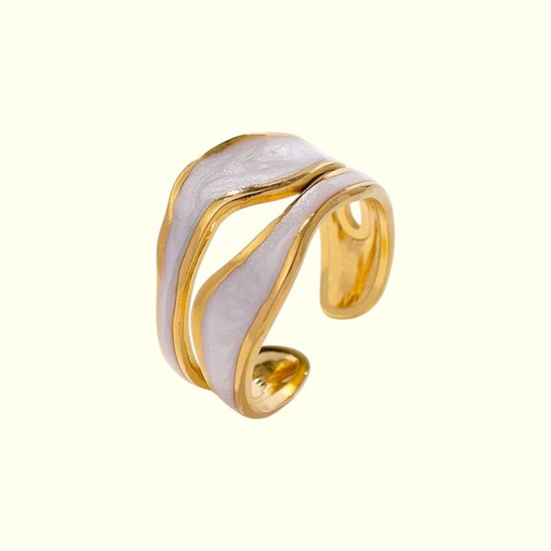 ivory stainless steel ring on a white background