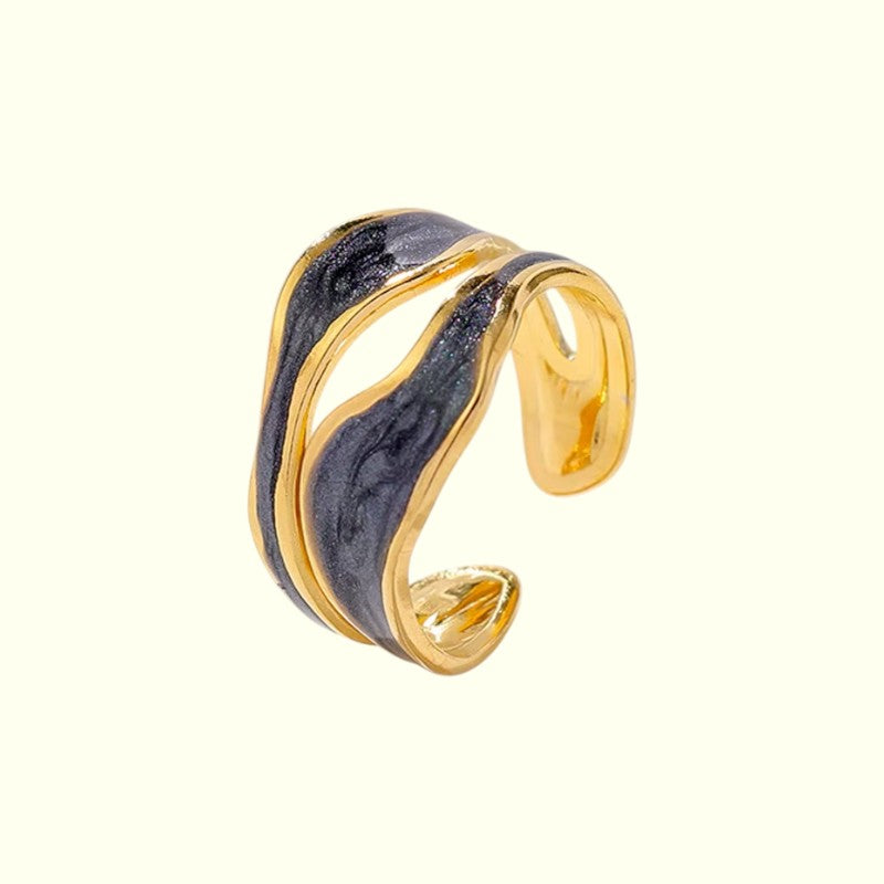 dark blue stainless steel ring on a white background