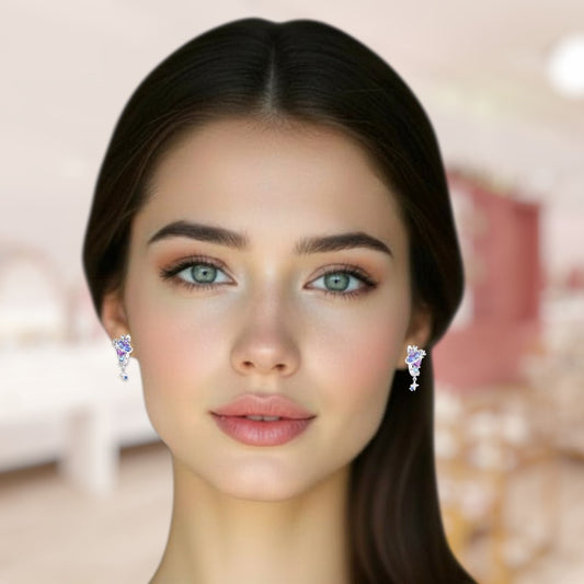 Close-up of a woman wearing sparkling earrings with a blurred background
