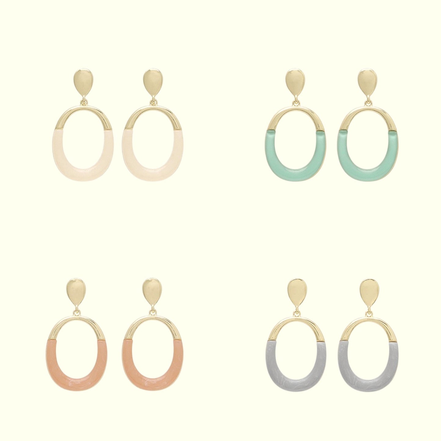 Set of earrings with gradient designs on a white background