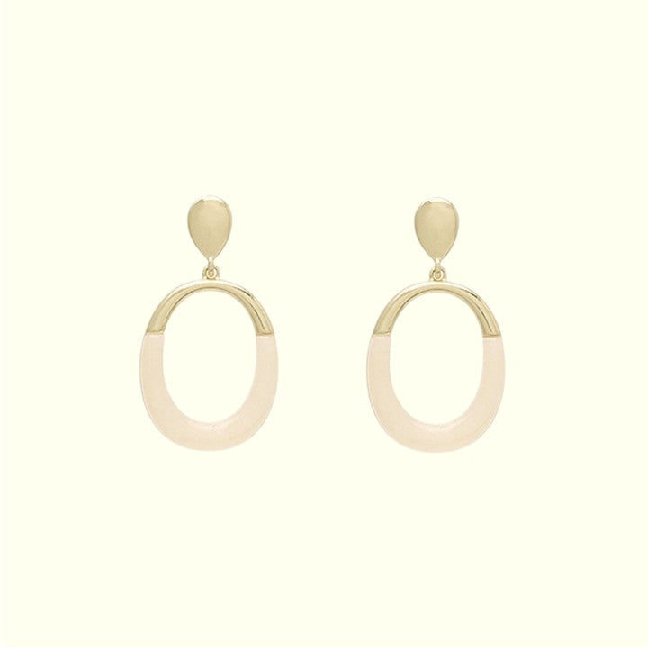 Pair of earrings with gold and beige hoop design on a white background