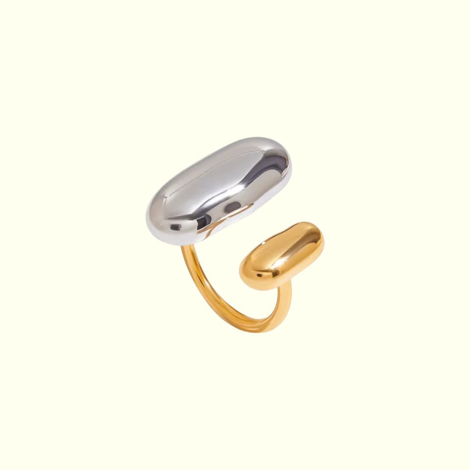Gold and silver ring on a white background