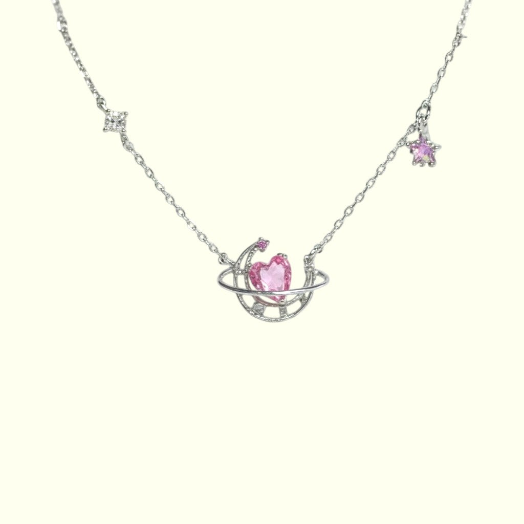 Necklace with a pink heart-shaped pendant on a white background