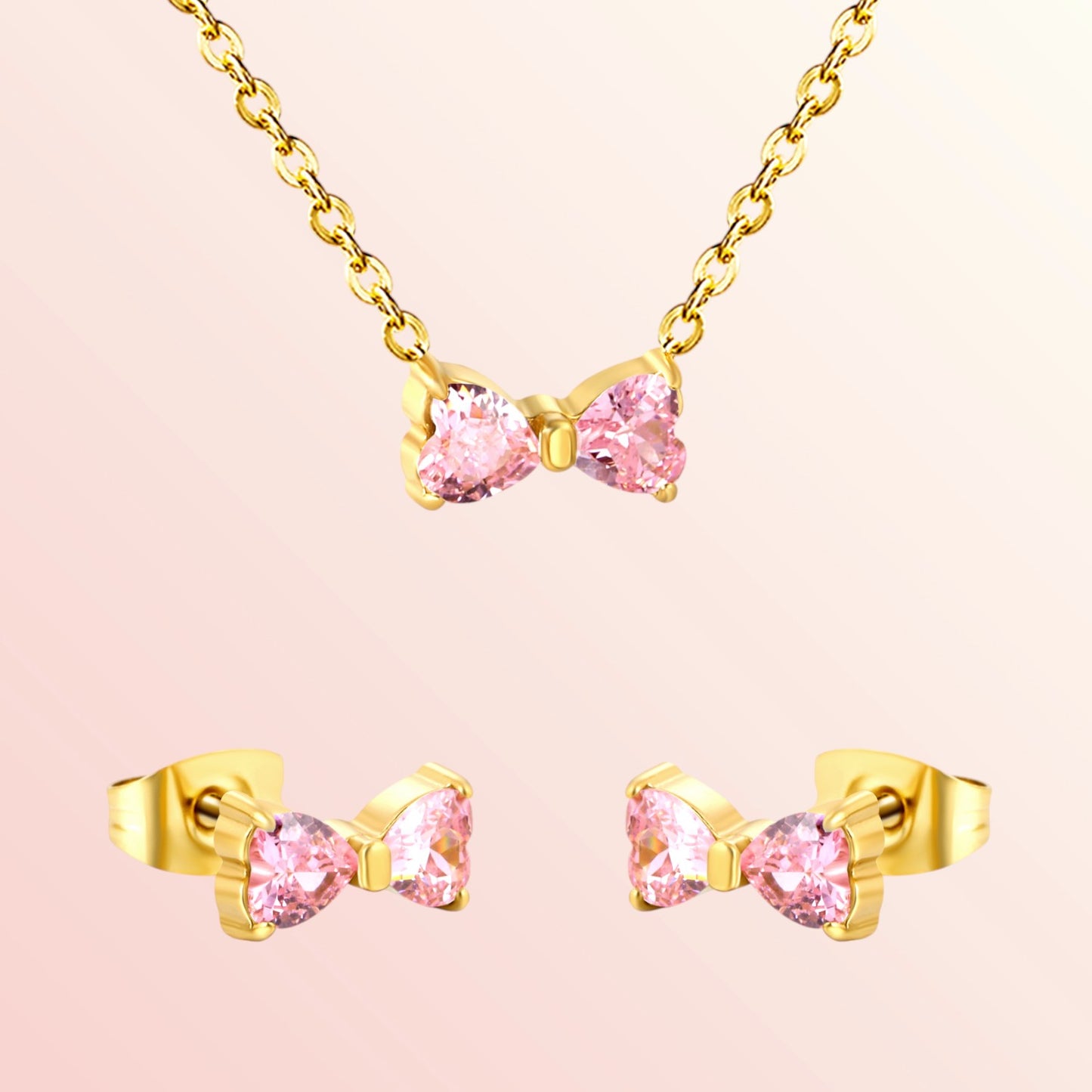 Gold bow-shaped earrings with pink gemstones on a light pink background