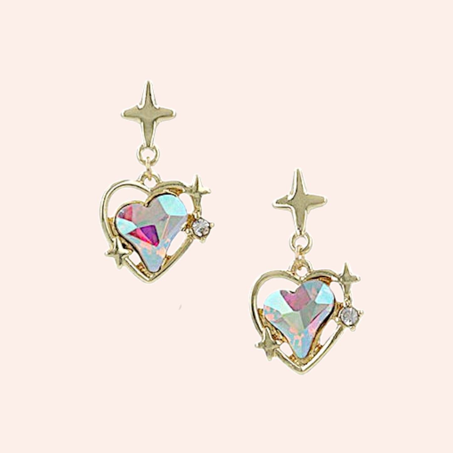 Heart-shaped earrings with star accents on a light pink background