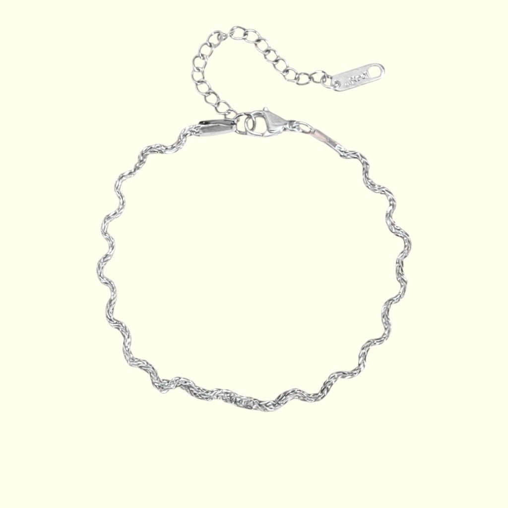 Silver bracelet on a white background