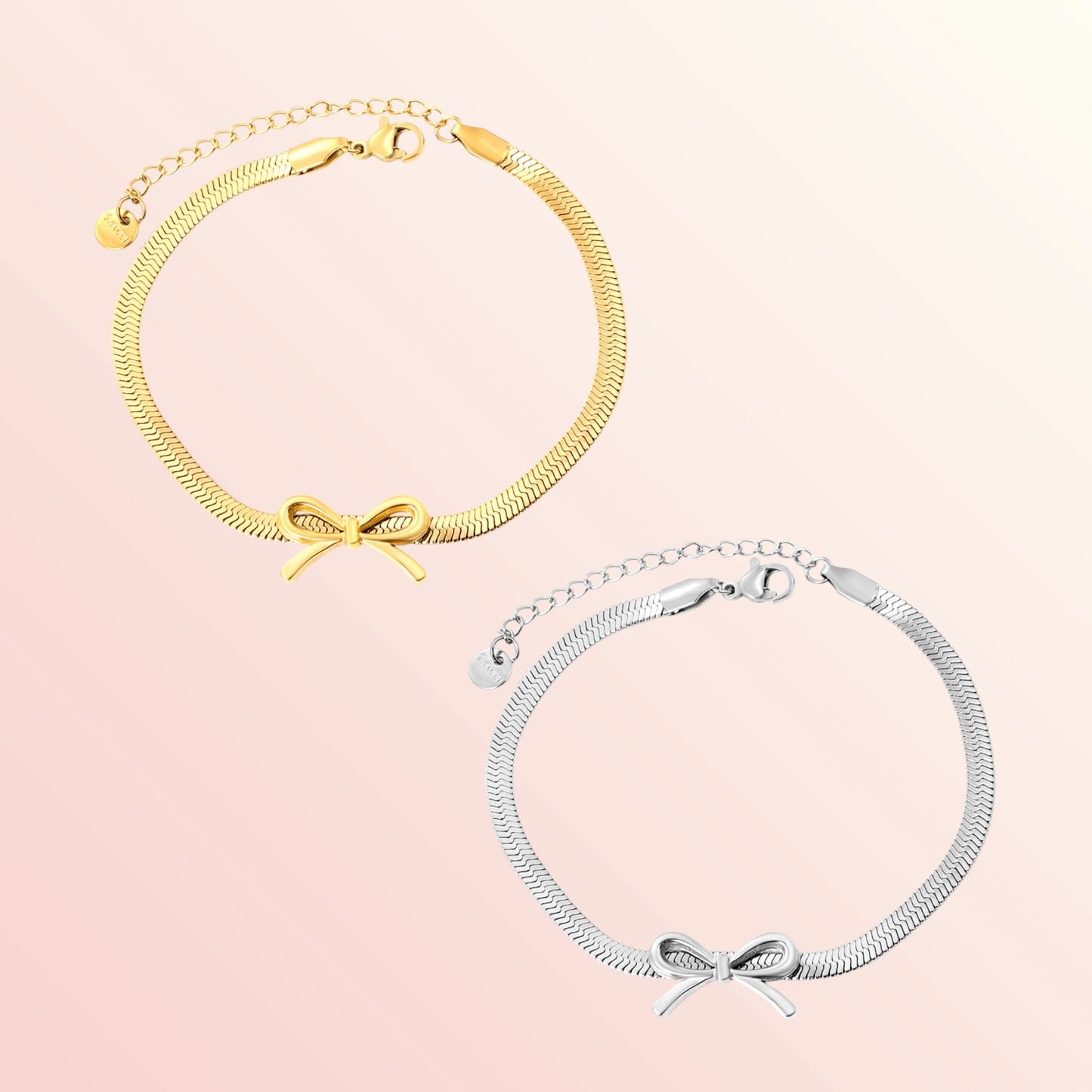 Gold and silver anklets with bow details on a pink background