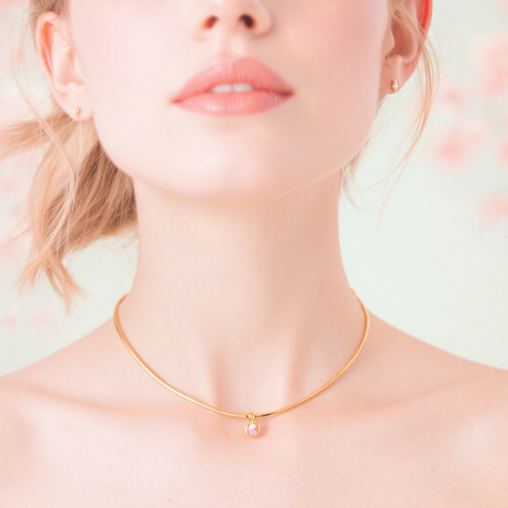 Elegant necklace collection featuring delicate designs in stainless steel with 18K gold plating, sparkling zirconia, and charming details like crosses, hearts, and floral accents. A perfect blend of sophistication and trendiness.