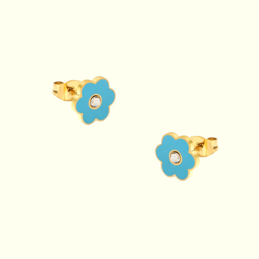 Pair of turquoise flower-shaped earrings with gold accents on a white background