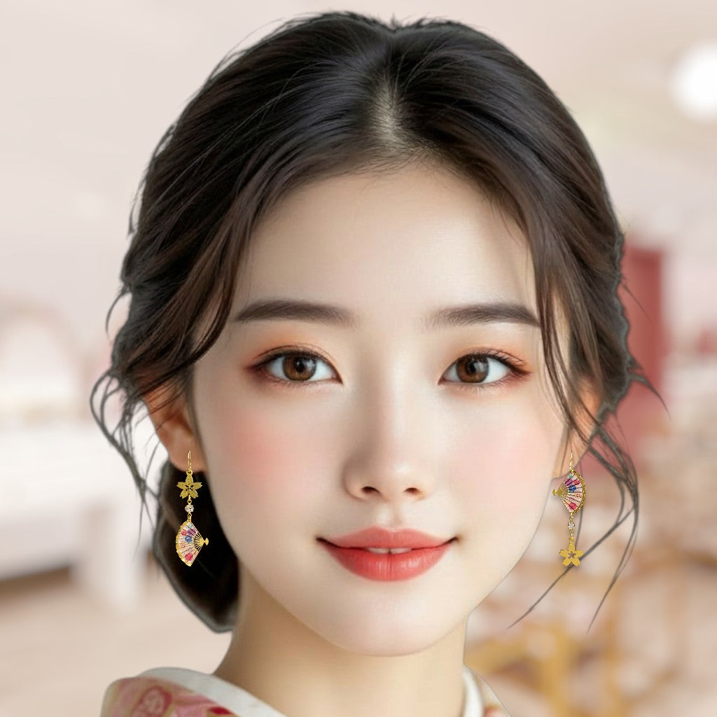 Close-up of a person with decorative earrings against a blurred background