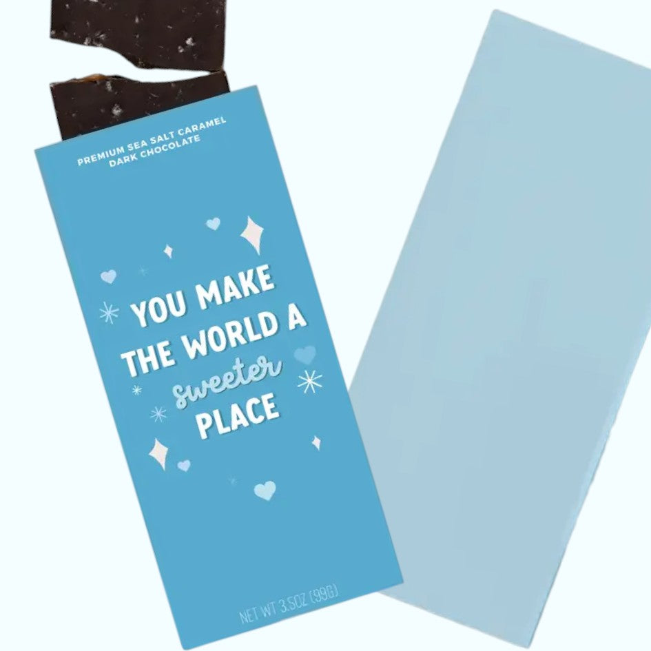 Blue chocolate bar packaging with text 'You Make the World a Sweeter Place' on a white background