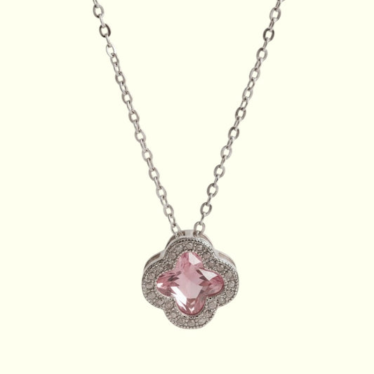 Necklace with a pink pendant on a white background