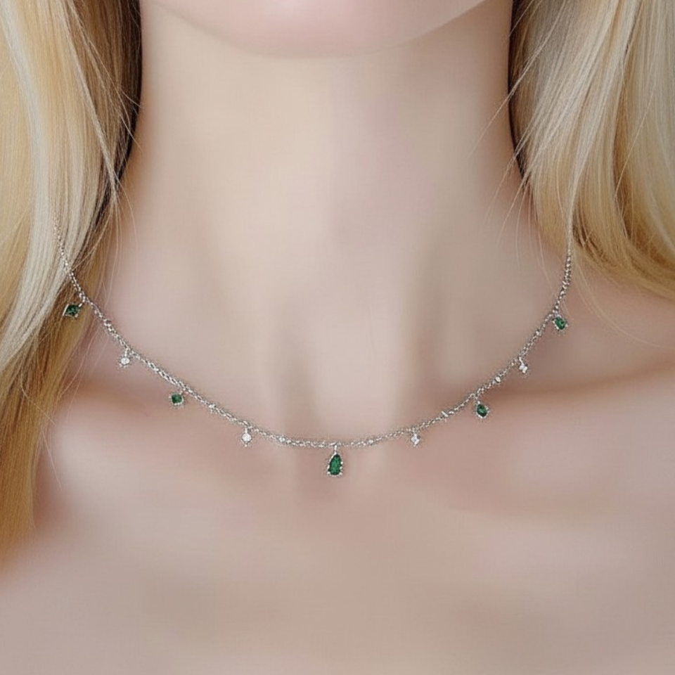 Necklace with green gemstones worn by a model