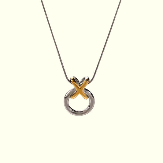 Necklace with a unique pendant design on a white background