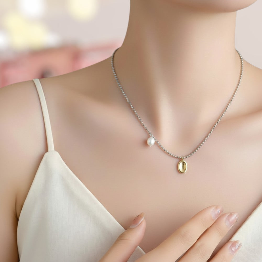 Necklace with a pendant on a mannequin with a blurred background
