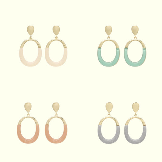 Set of earrings with gradient designs on a white background