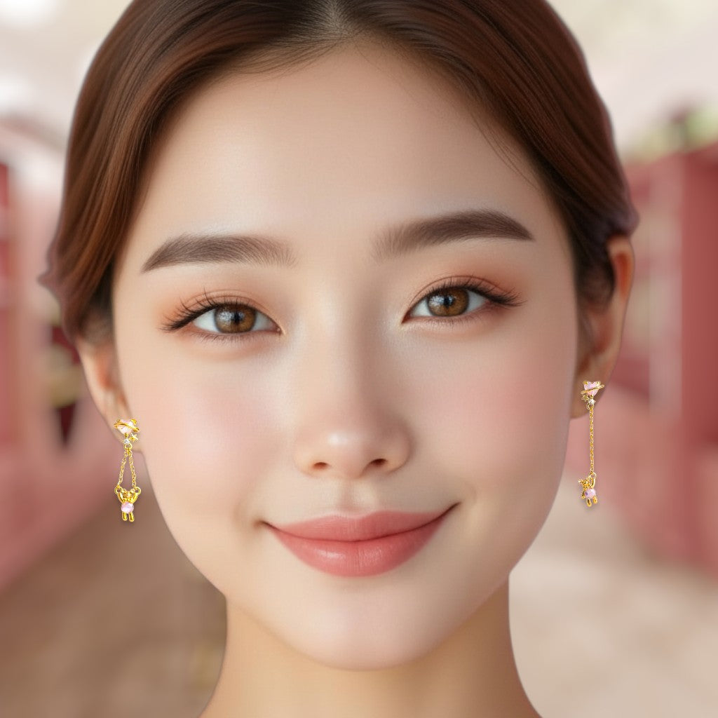 Close-up of a woman wearing gold earrings with a blurred background