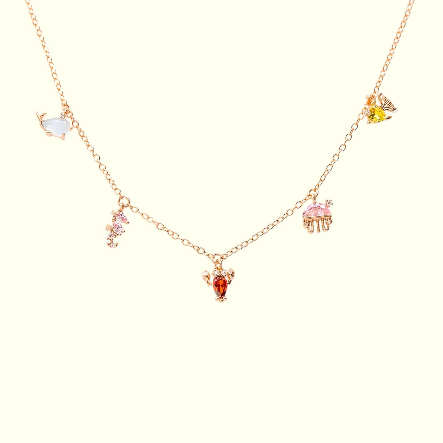 Necklace with colorful gemstone pendants on a white background