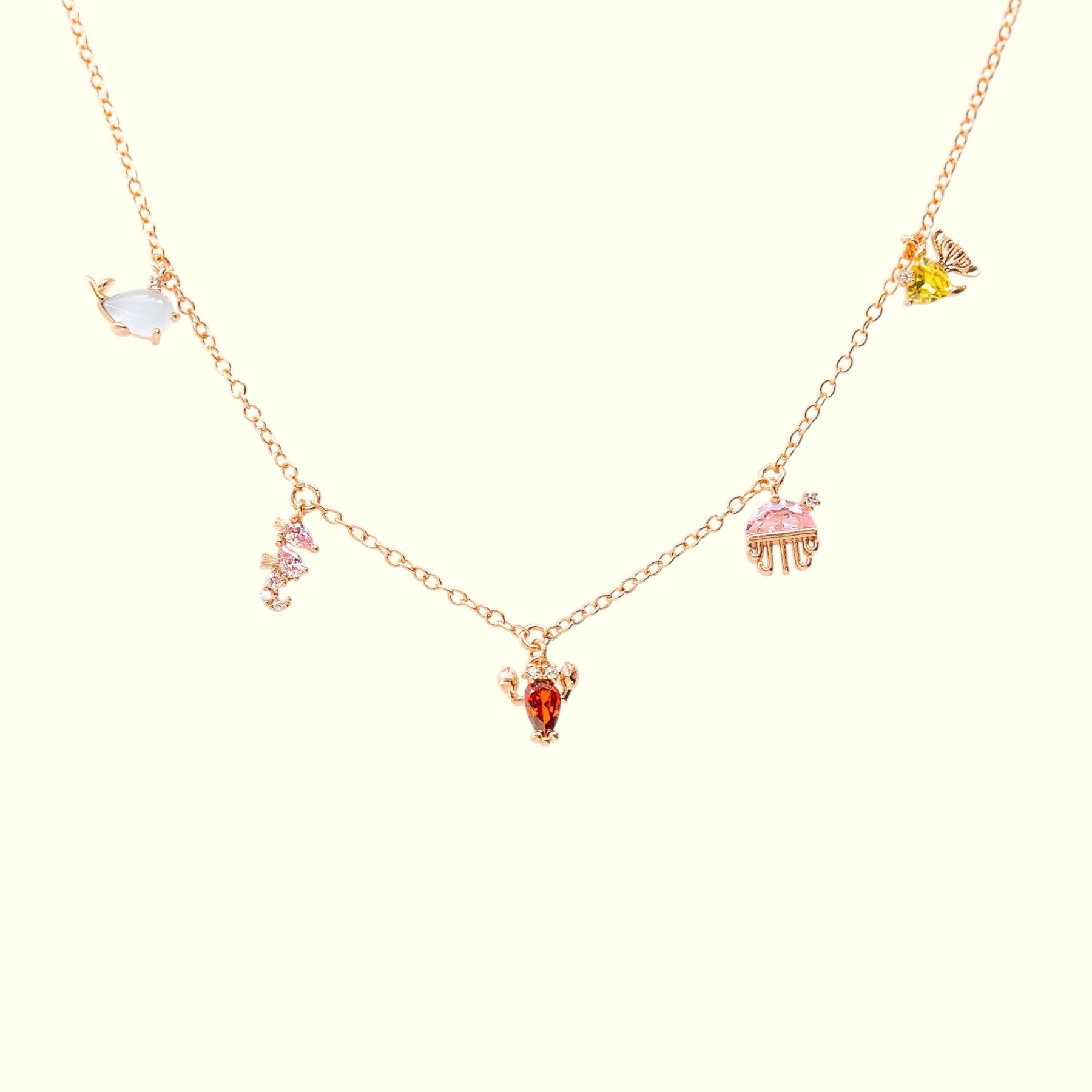 Necklace with colorful gemstone pendants on a white background