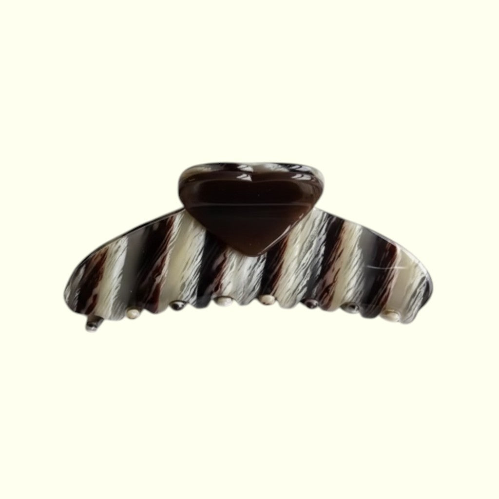 Striped hair clip on a white background
