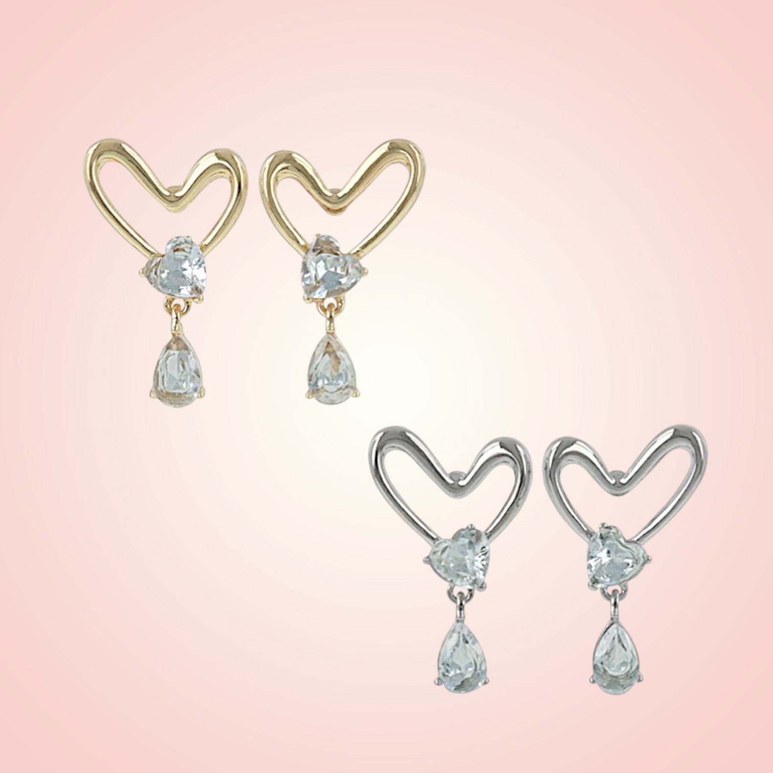 Heart-shaped earrings with teardrop-shaped gemstones on a pink background