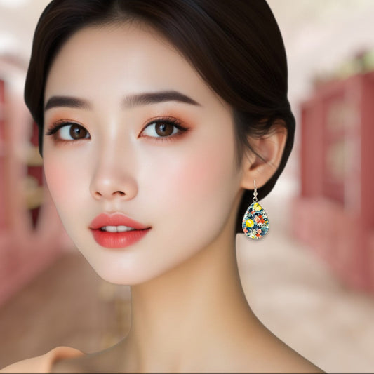 Close-up of a woman wearing colorful earrings with a blurred background