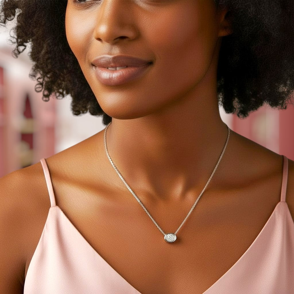 Woman wearing a delicate necklace with a blurred background
