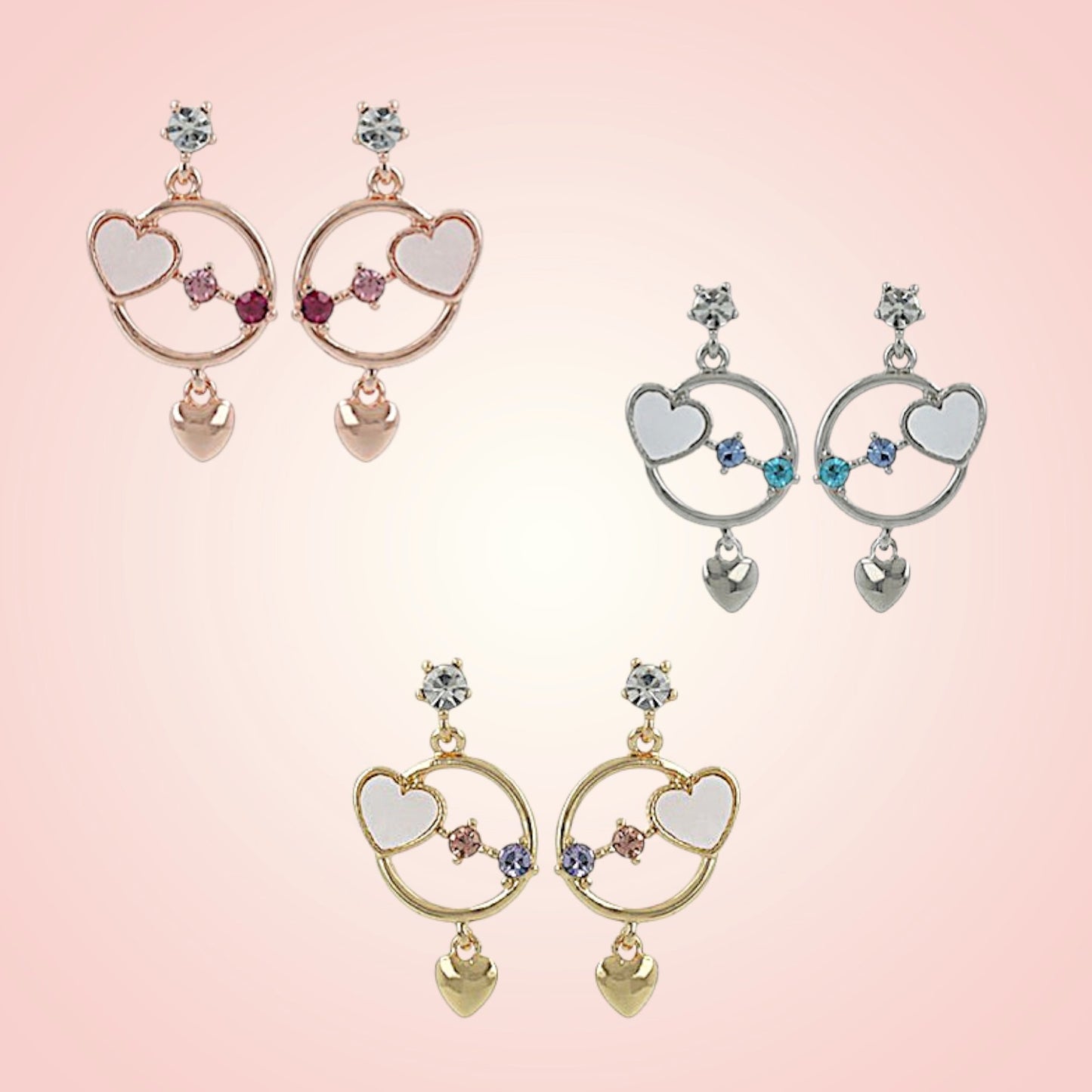 Pair of heart-shaped earrings on a pink background