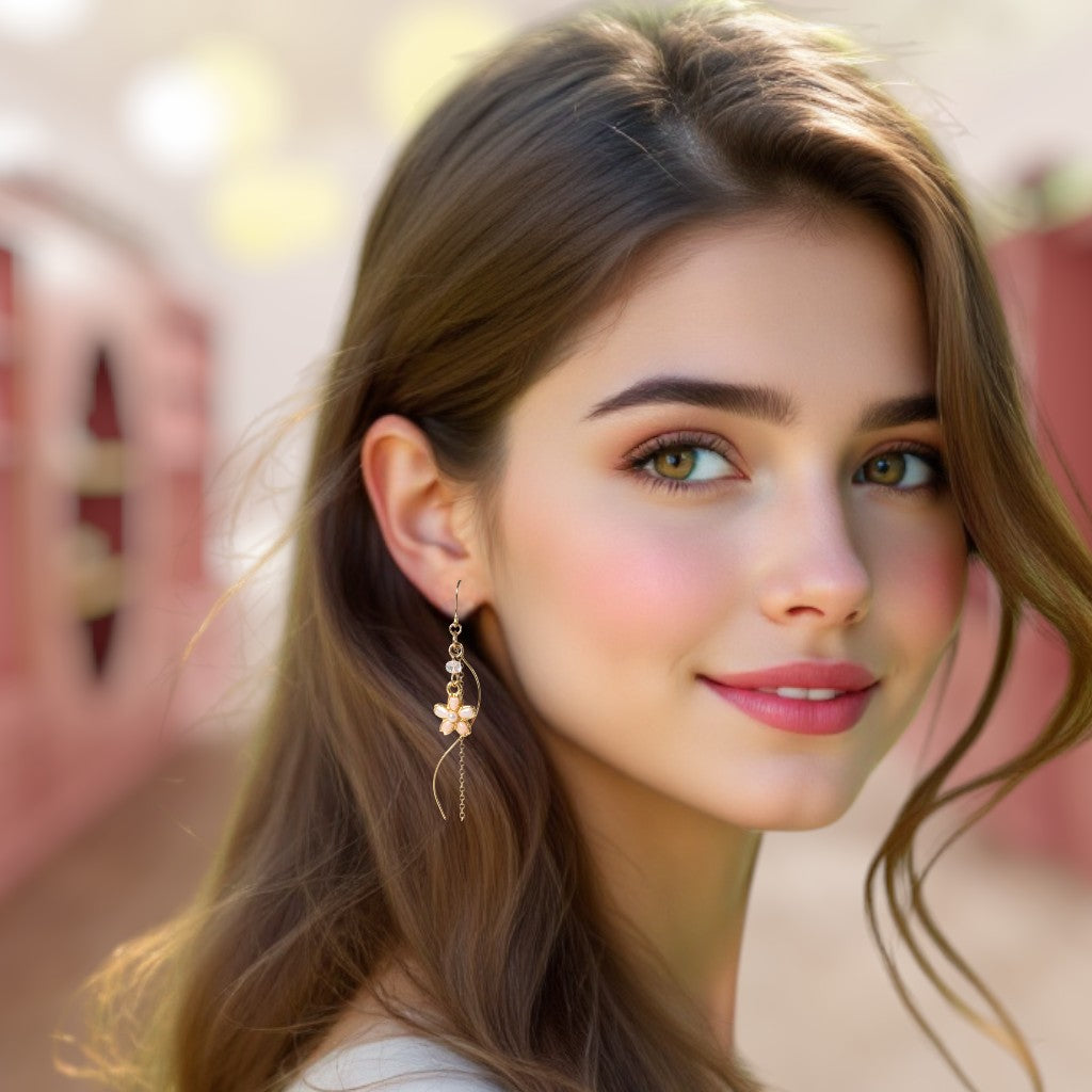 Close-up of a woman wearing earrings with a blurred background
