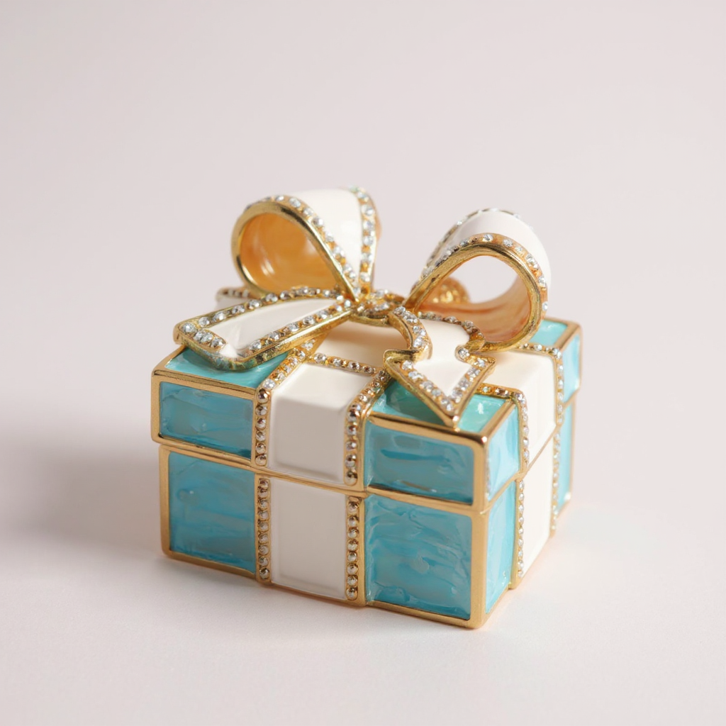 Decorative box with a gold bow on a light background