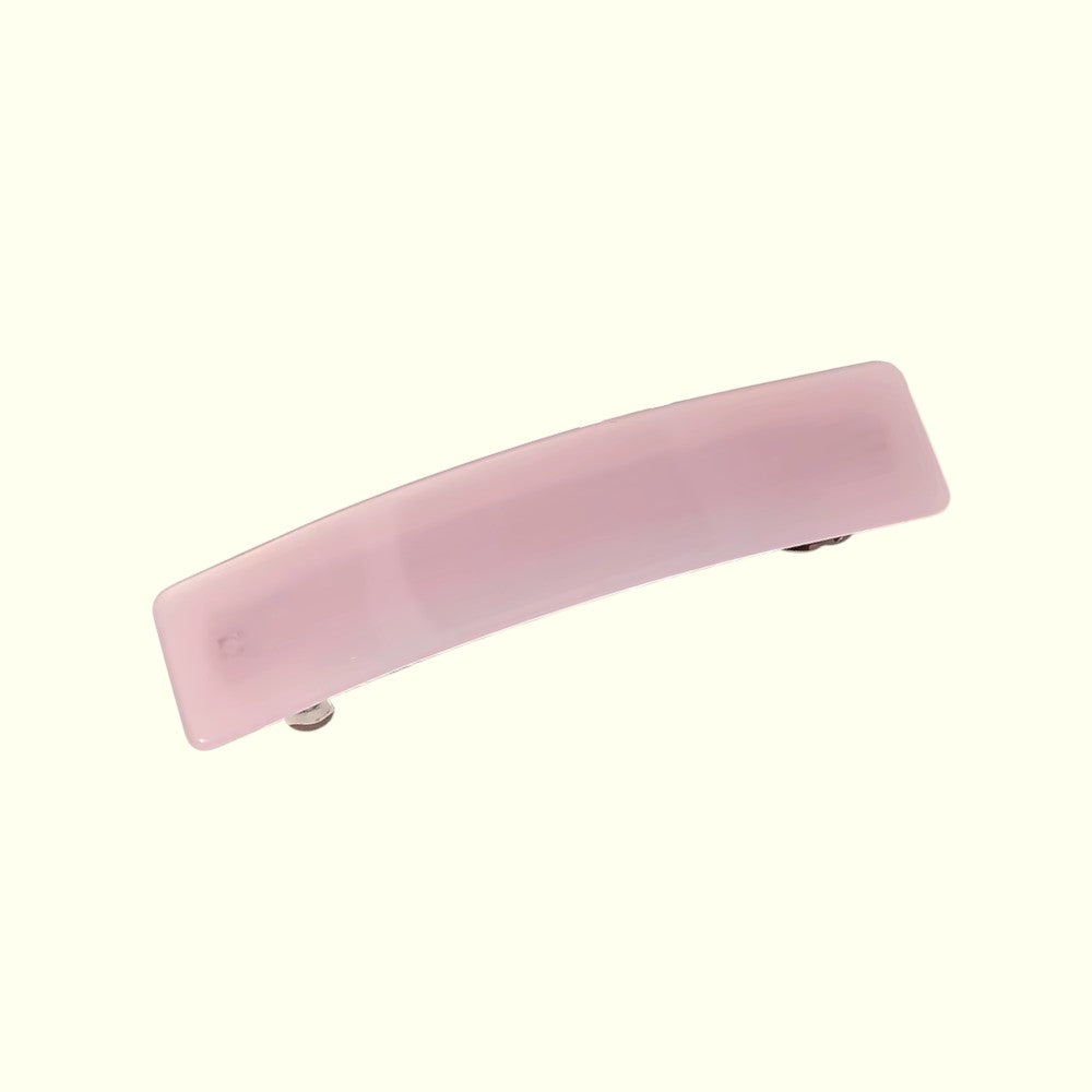 Pink hair clip on a white background