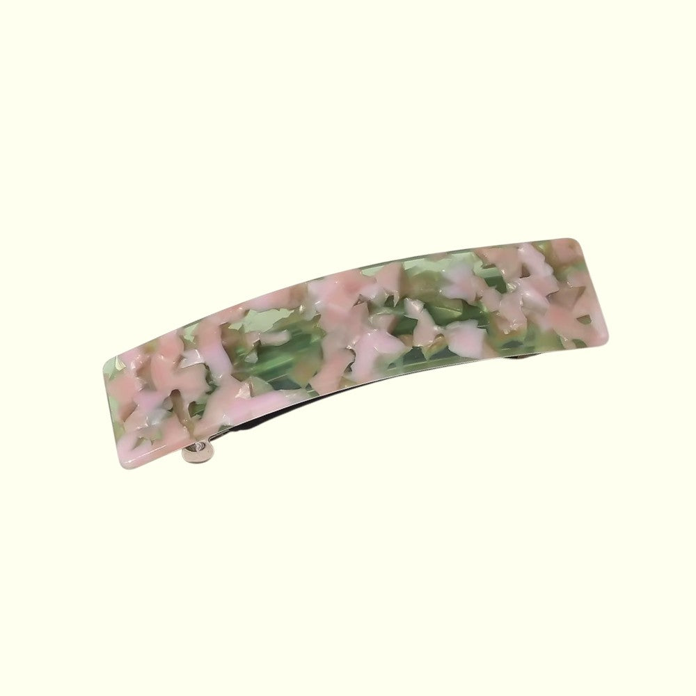 Floral patterned hair clip on a white background
