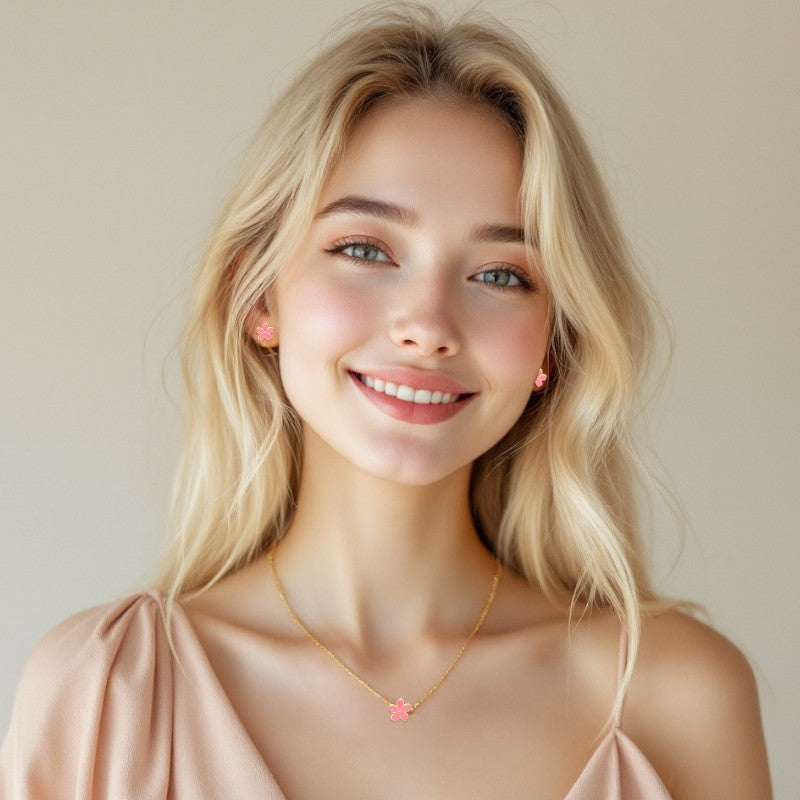 a girl wearing a pink flower pendant necklace