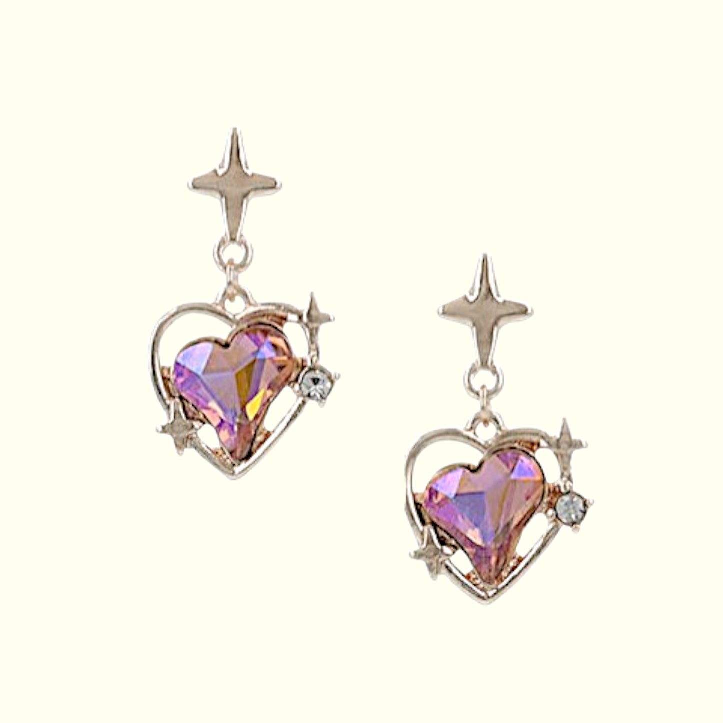 Heart-shaped earrings with star accents on a white background