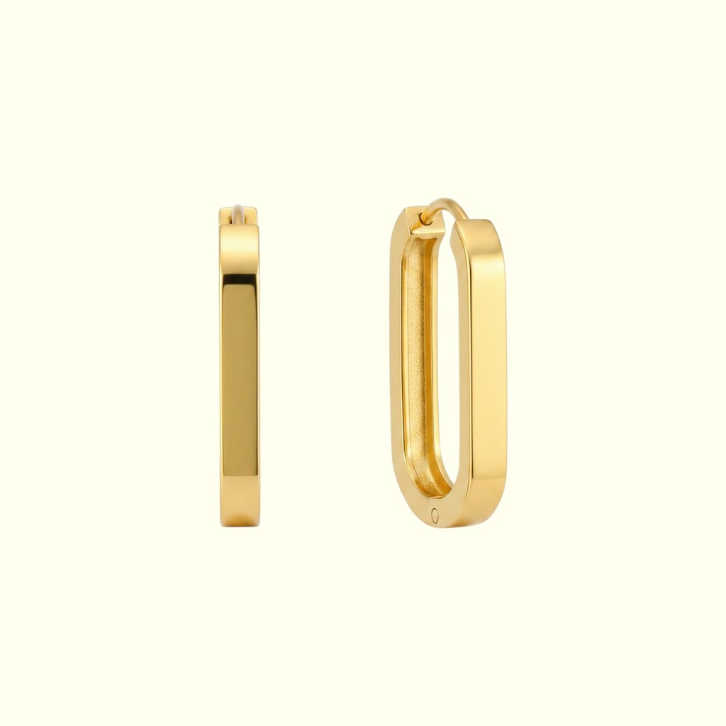 Gold hoop earrings on a white background